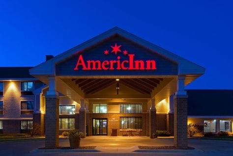 AmericInn hotel exterior, heading an article on a US hotel group's Gulf expansion