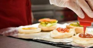 Five-Guys Five Guys restaurant, heading an article on new UAE outlets
