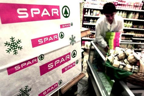 SPAR supermarket exterior, heading an article on its Oman store rollout