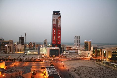 Manama skyline in Bahrain, heading an article on expat worker fees