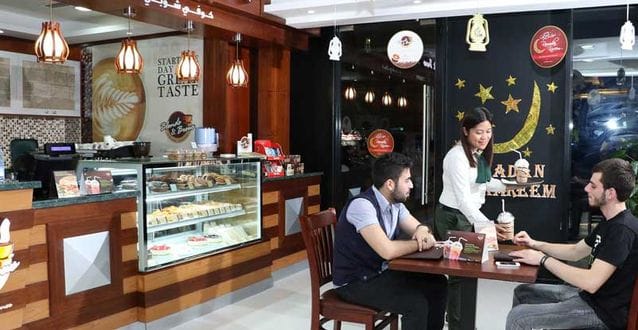 Speciality coffee being poured, used in EER Middle East's coffee market coverage