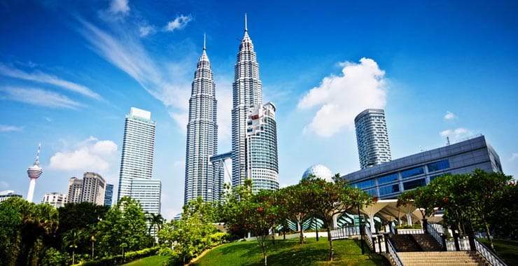 Kuala Lumpur skyline, heading an article on Lulu Hypermarket's first Malaysian store