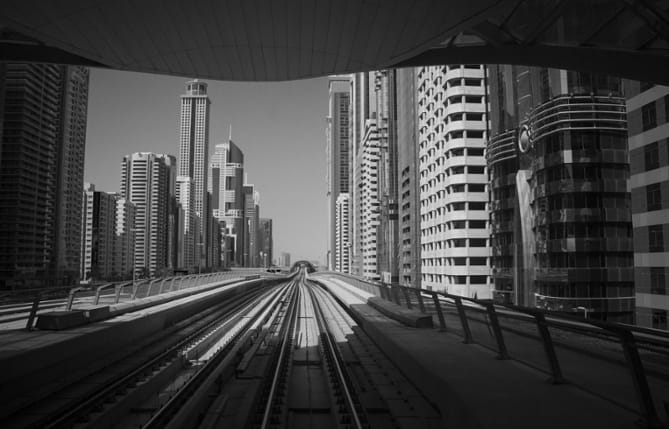 Dubai Metro train and station, heading an article on UAE work permit changes