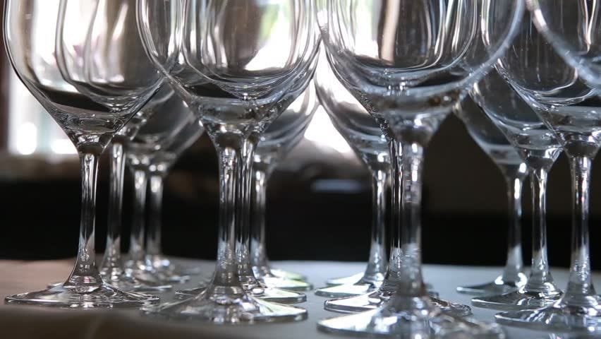 Wine glasses on a table, heading an article on changing social rules in Saudi Arabia