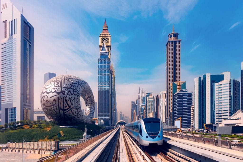 Dubai cityscape with skyscrapers and the metro railway